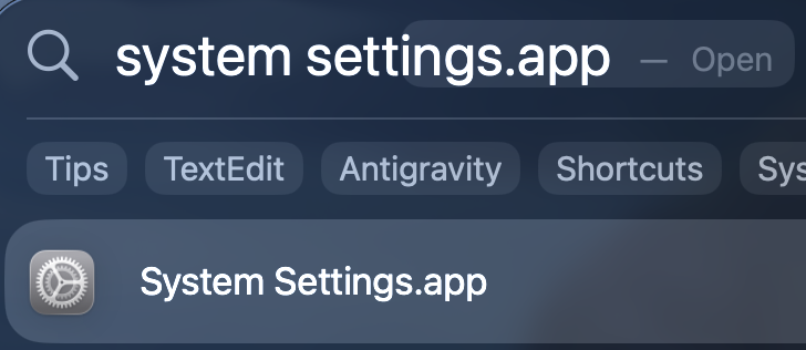 Spotlight search with system settings typed and System Settings.app at the top